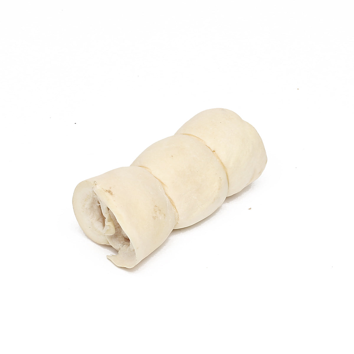 Rolled-up piece of cheek roll on a white background